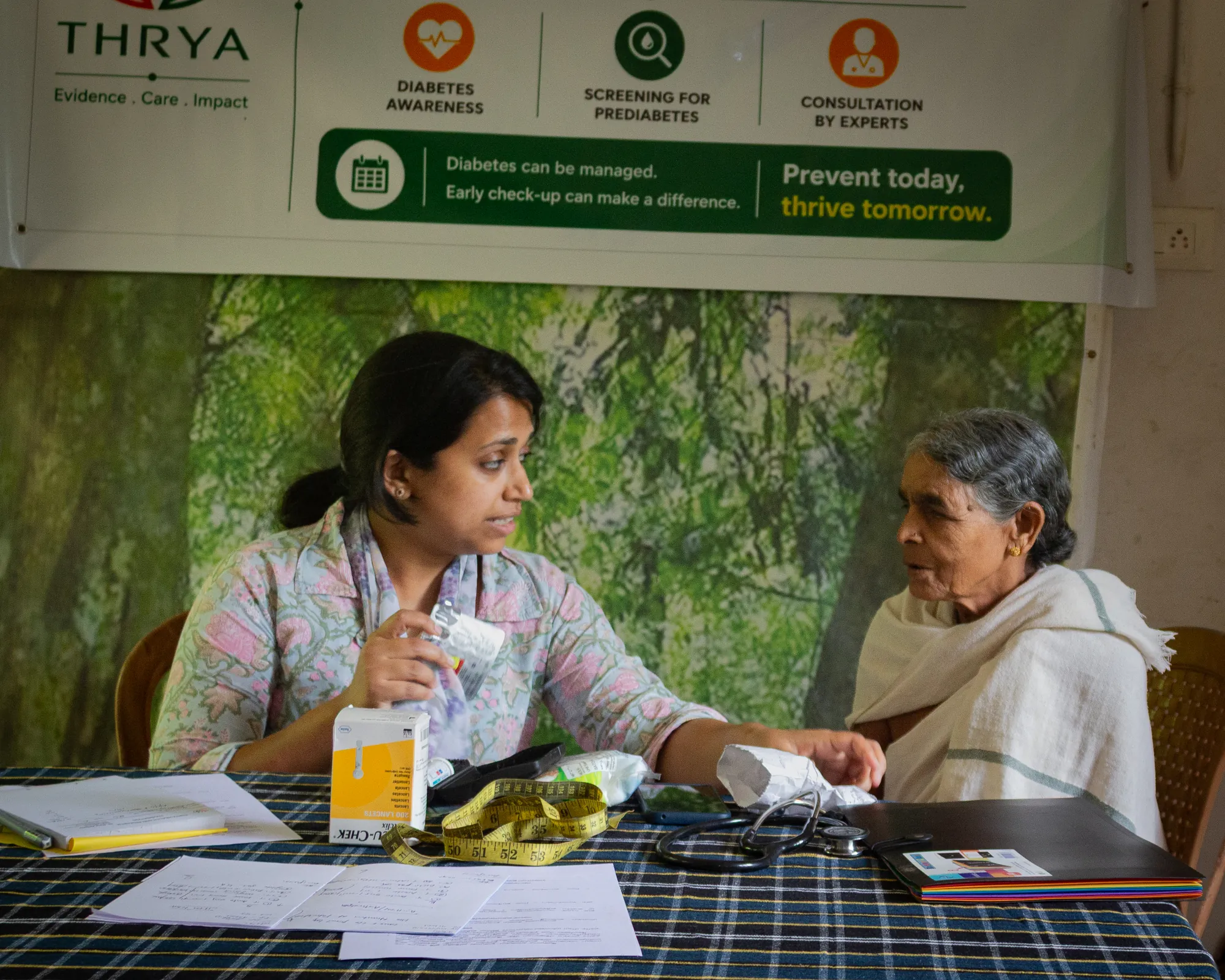 Thrya health workers conducting a diabetes awareness session in Wayanad